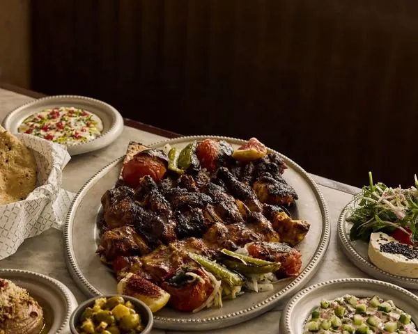 An atmospheric table set with food